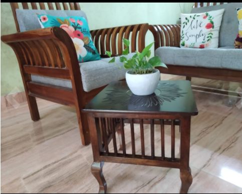 Customer photo review of Mango Wood Walnut Finish Handmade Carving Classic Side Table for Living Room (Brown)
