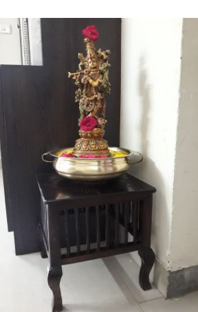 Customer photo review of Mango Wood Walnut Finish Handmade Carving Classic Side Table for Living Room (Brown)