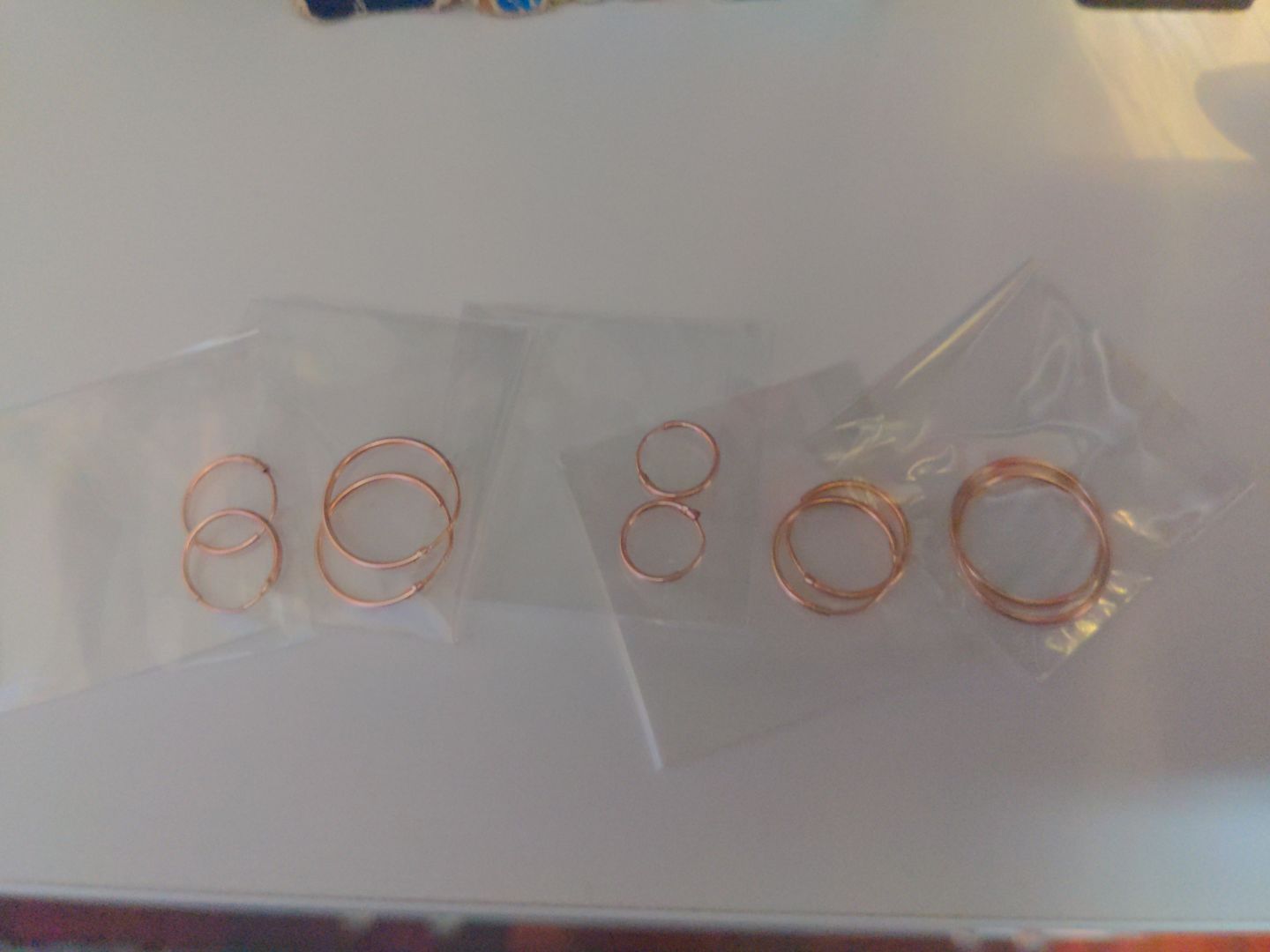 Customer photo review of Set of 5! 925 Sterling Silver Gold Tone Plated Endless Hoop Earrings
