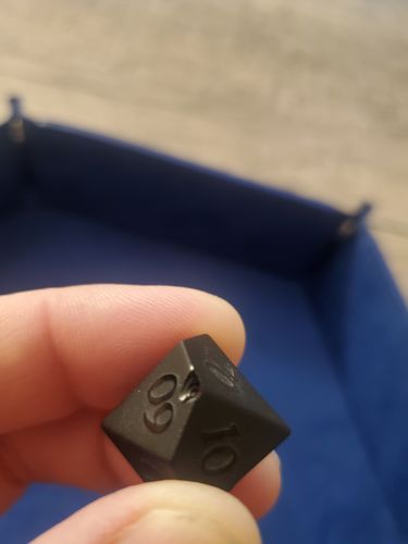 Customer photo review of Raised Black Obsidian DnD Dice Set All Number Dice