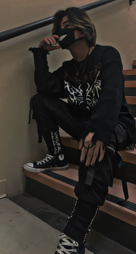 Customer photo review of NEV Dark Ripped Skeleton Letters Print Oversized Sweater