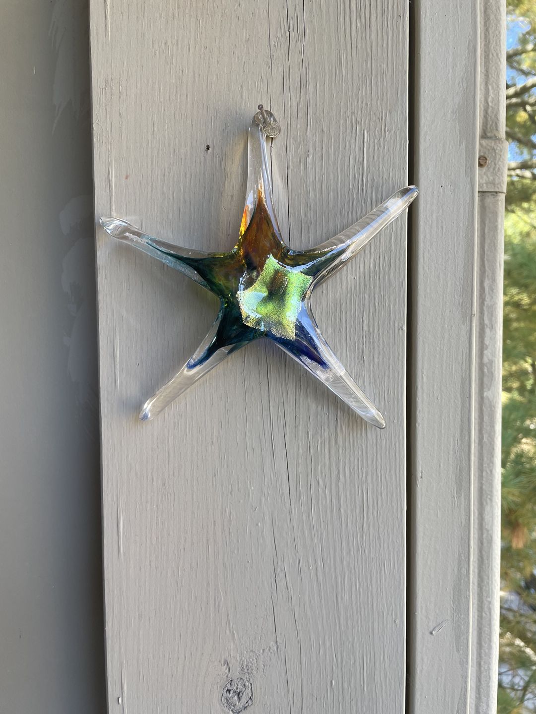 Customer photo review of Dichroic Starfish Suncatcher with Infused Cremains
