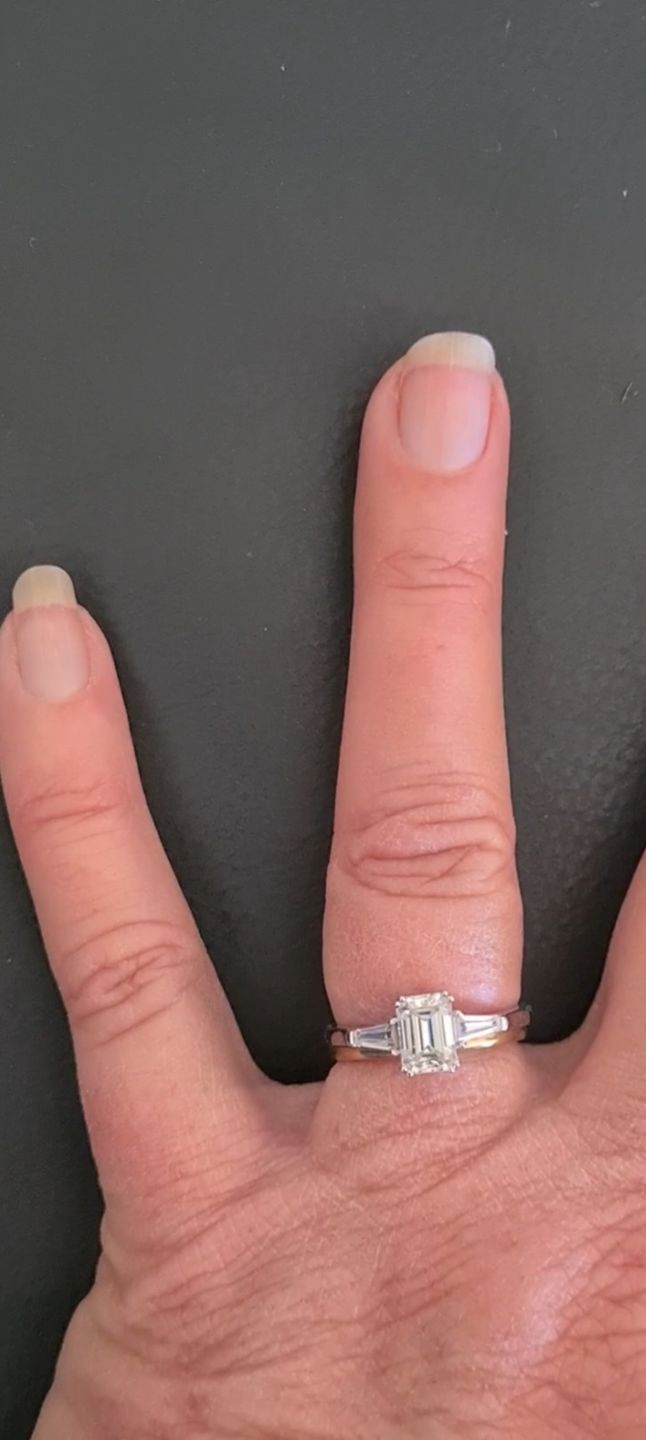 Customer photo review of Three Stone Emerald Cut Moissanite Tapered Baguette Engagement Ring
