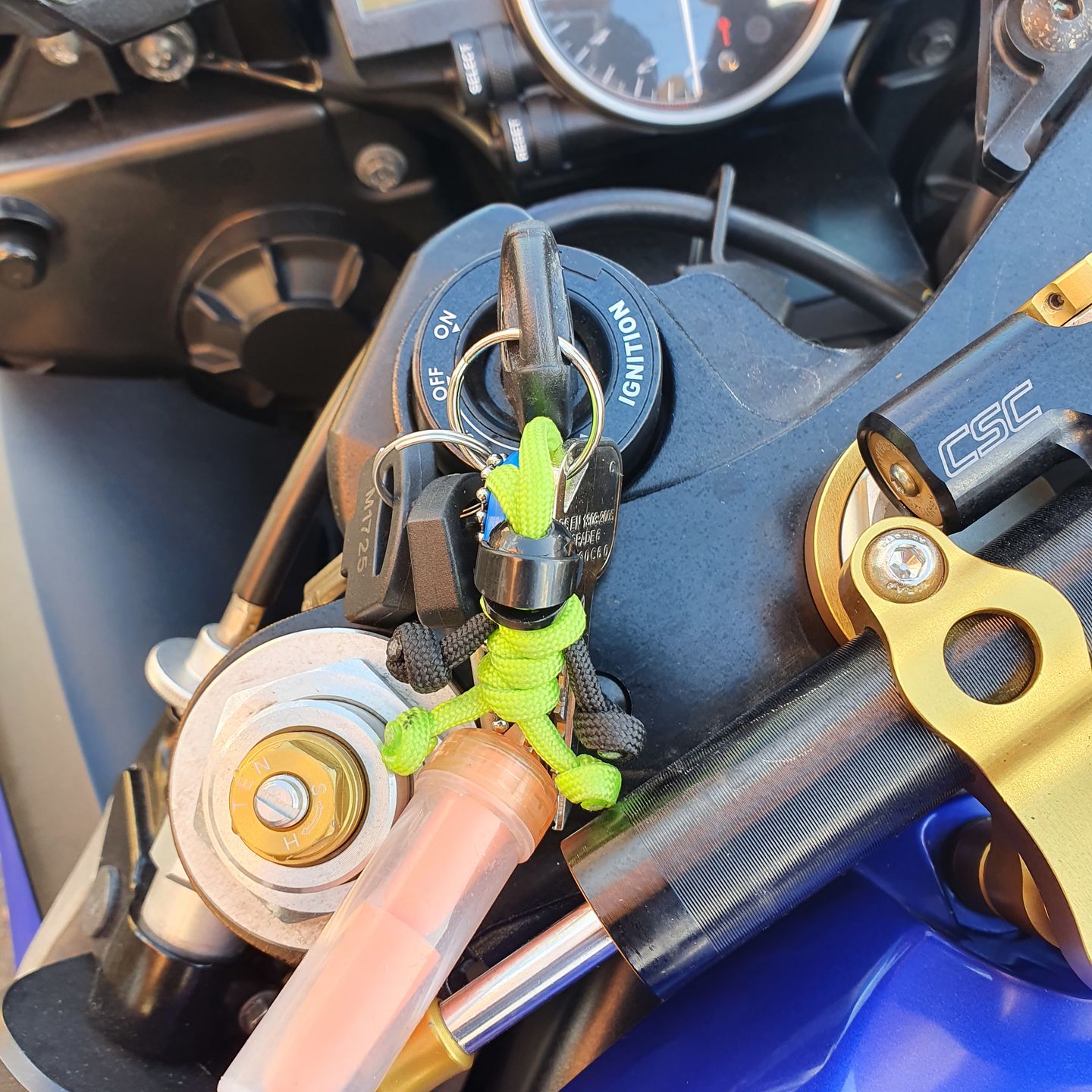 Customer photo review of Black Green Biker Buddy Paracord Keychain