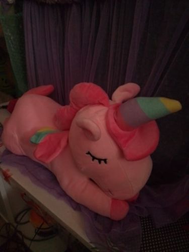 Customer photo review of Jumbo Rainbow Unicorn Plushie Collection