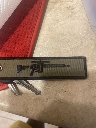 Customer photo review of Armed Jet Tag