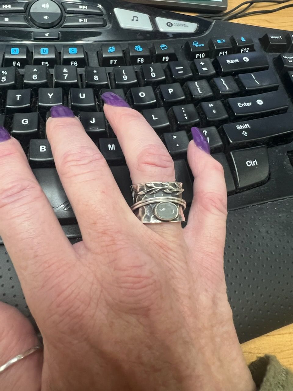 Customer photo review of Aquamarine Leaf Spinner ring Sterling Silver