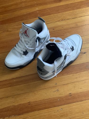 Customer photo review of Air Jordan 4 “White Cement”