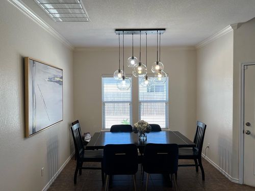 Customer photo review of Modern 7-Light Sculptural Glass Globe Pendant Chandelier