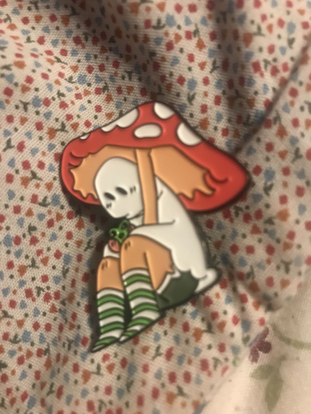 Customer photo review of Mushroom Ghost Enamel Pin