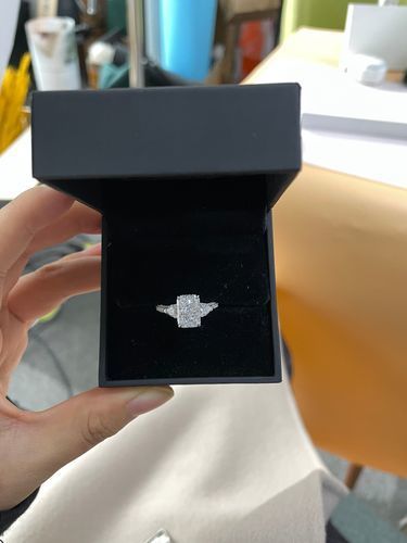 Customer photo review of Louily 5.0 Carat Radiant Cut Three Stone Engagement Ring With Two Heart Cut Side Stones