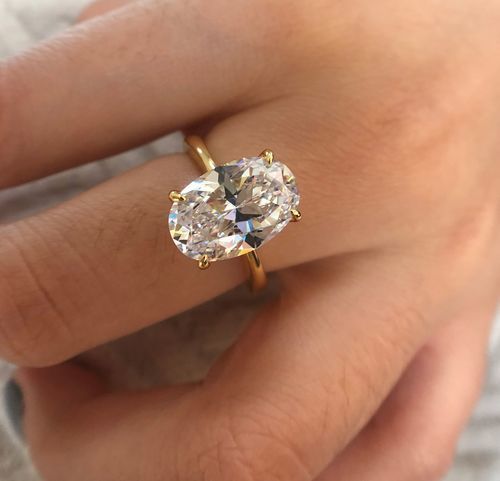 Customer photo review of Louily Yellow Gold 3.5 Carat Oval Cut Solitaire Engagement Ring In Sterling Silver
