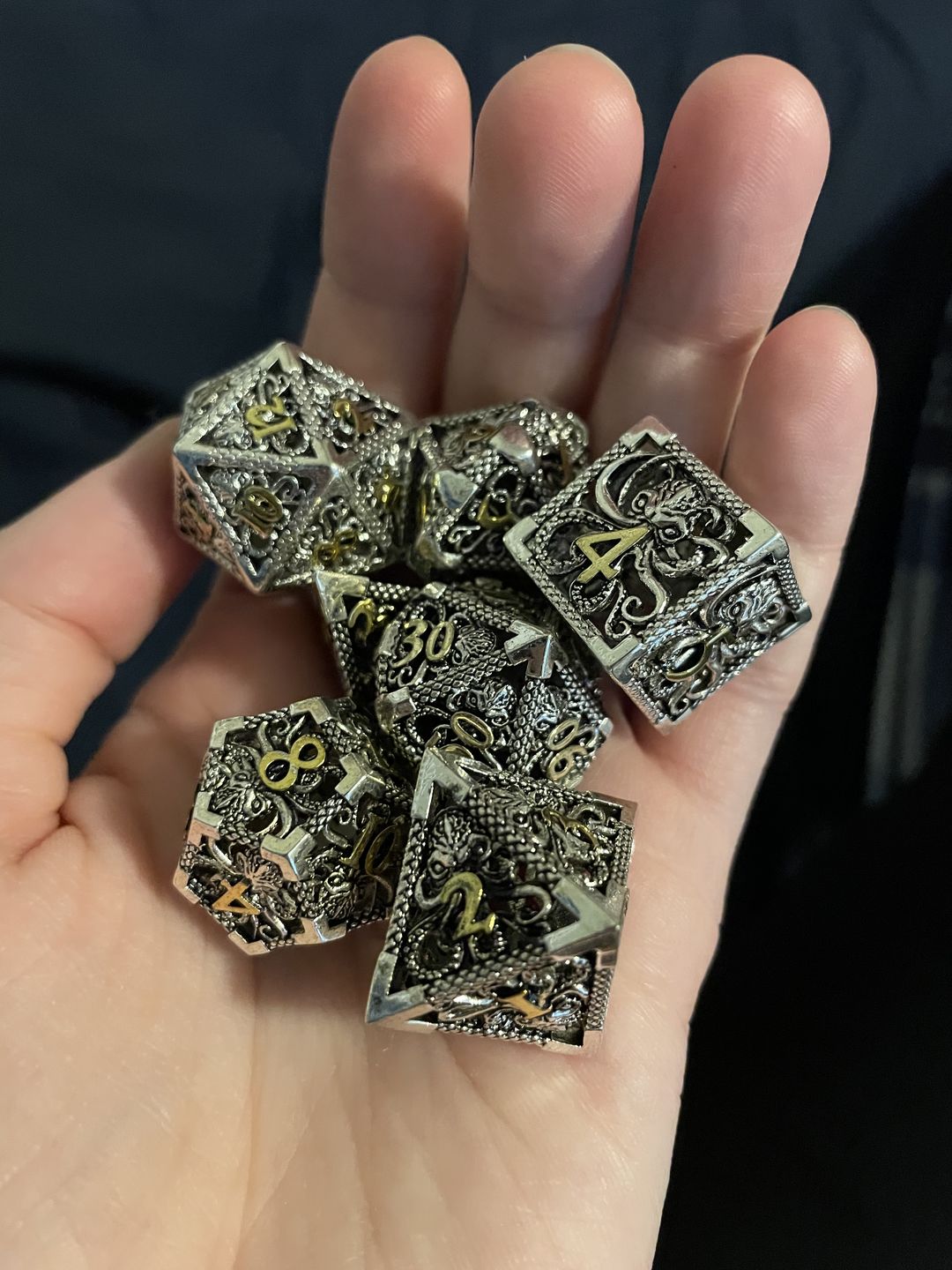 Customer photo review of URWizards D&D Hollowed Metal Dice Set Cthulhu Silver