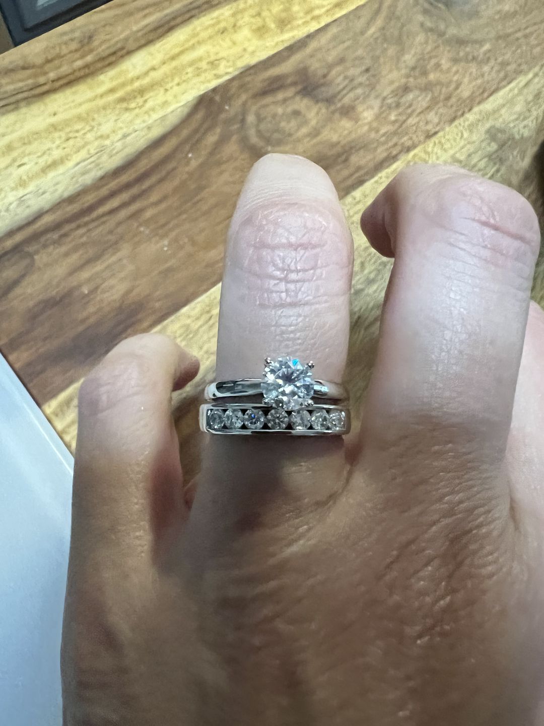 Customer photo review of Classic Solitaire Round Moissanite Four Prong Engagement Ring