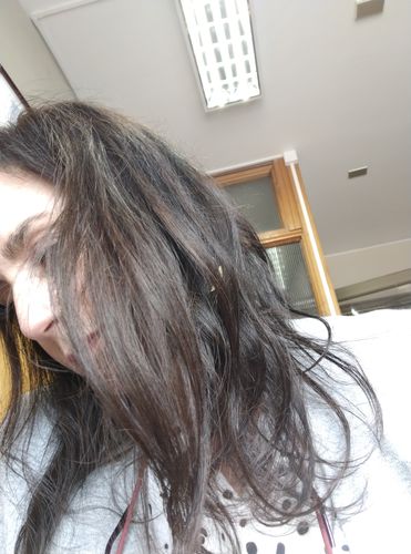 Reseña con foto de un cliente sobre Henna Jamila Hair