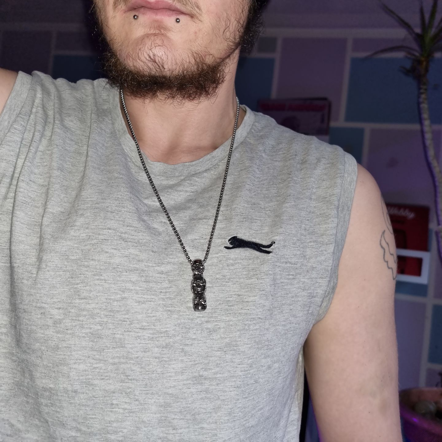 Customer photo review of HEAR SEE SPEAK PENDANT.