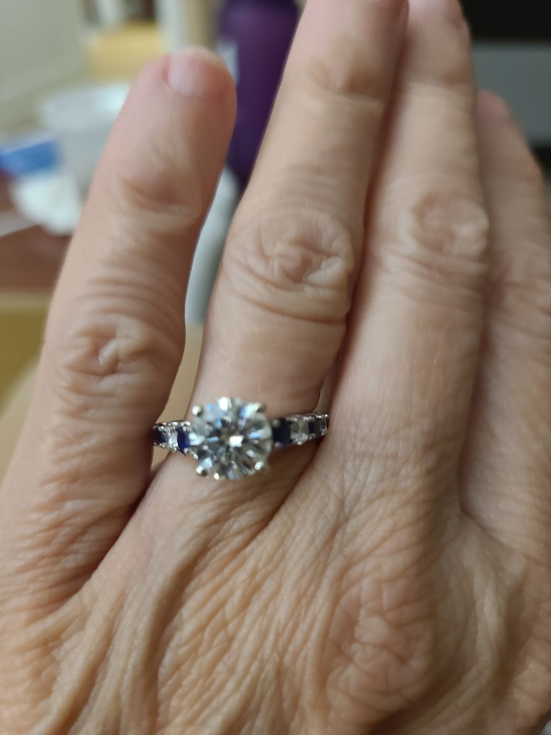 Customer photo review of Round Moissanite With Sapphire Pave Engagement Ring