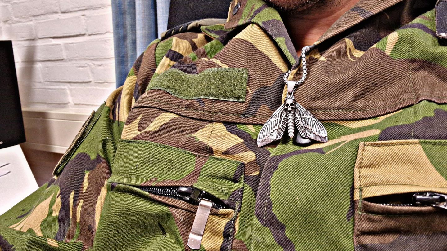 Customer photo review of SKULL BUTTERFLY PENDANT.