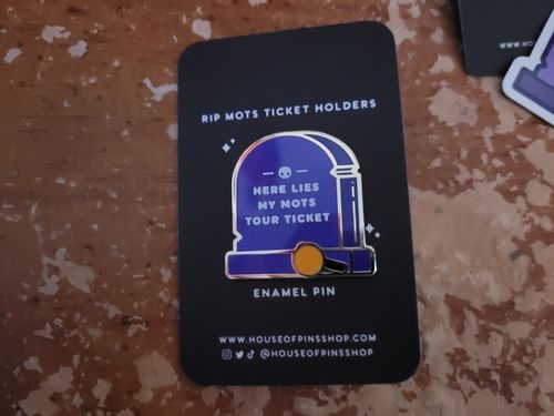 Customer photo review of MOTS Tour Tombstone Pin