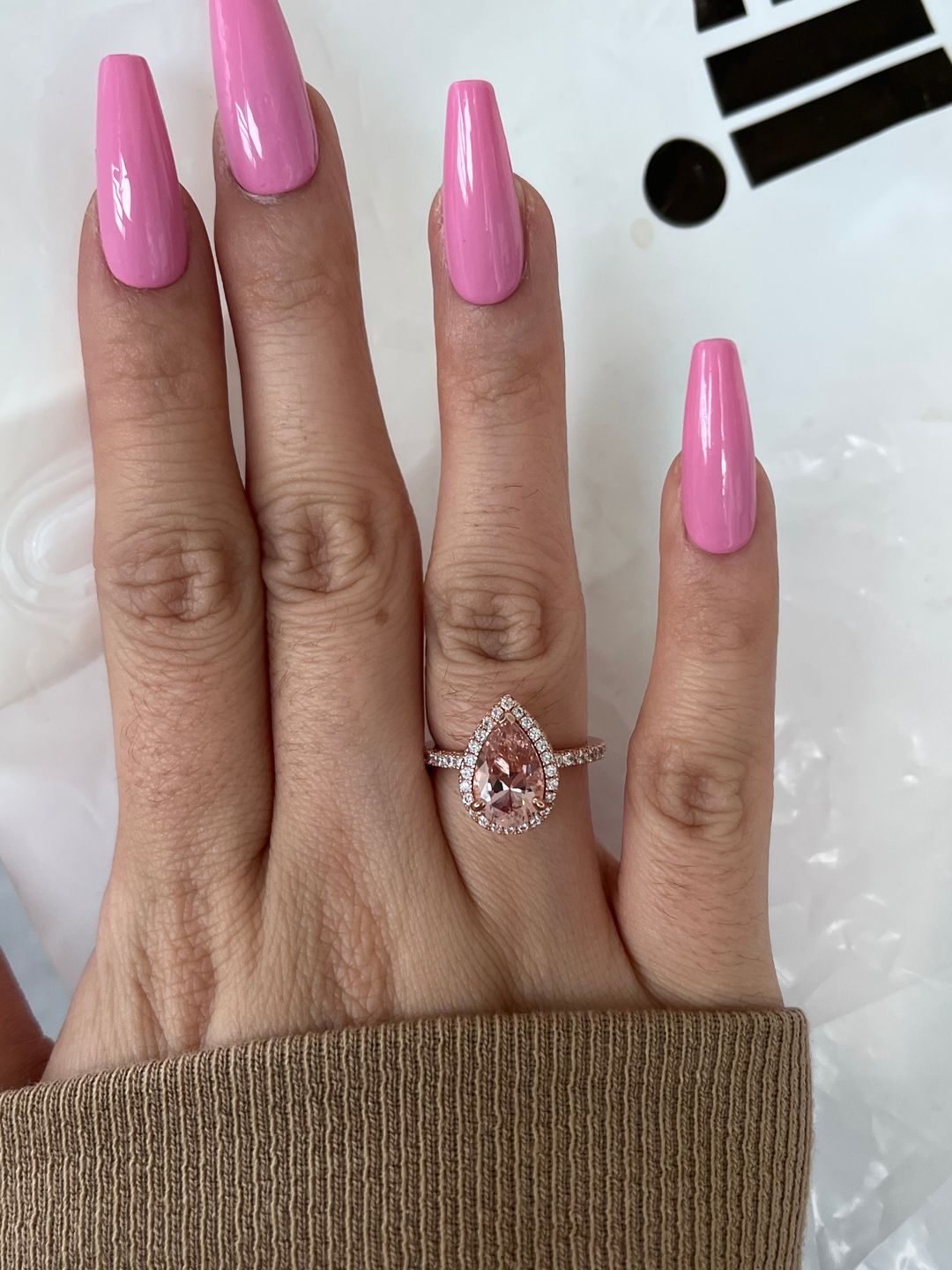 Customer photo review of Louily Rose Gold Halo Pear Cut Synthetic Morganite Engagement Ring