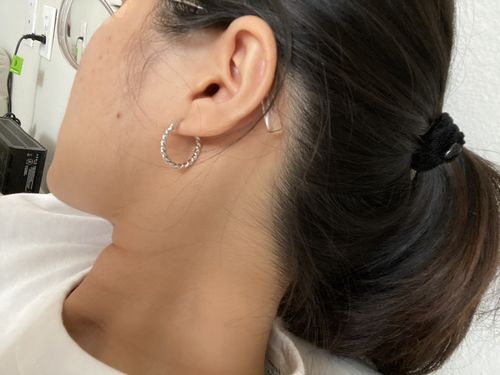 Customer photo review of Silver Twist Hoops