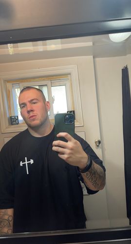 Customer photo review of Jesus is King Tee