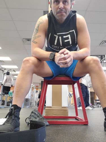 Customer photo review of Salty Savage “FIT Fuck, I’m Tired” Sleeveless Muscle Tank Hoodie | Black/White