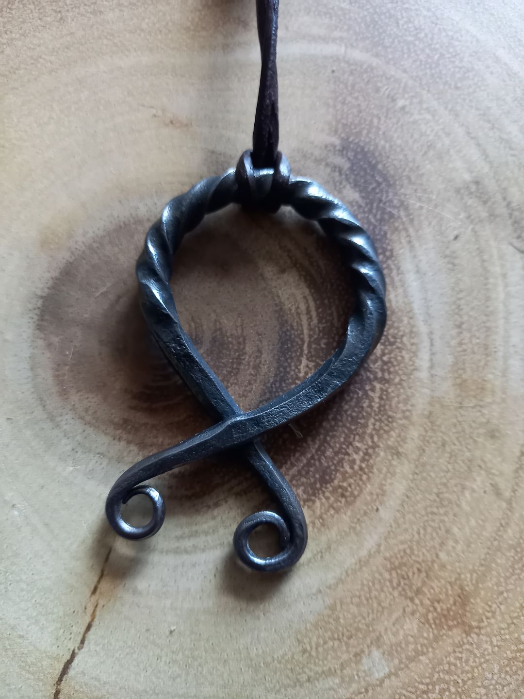 Customer photo review of Troll Cross Pendants