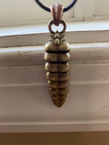 Customer photo review of Rattlesnake Tail Pendant