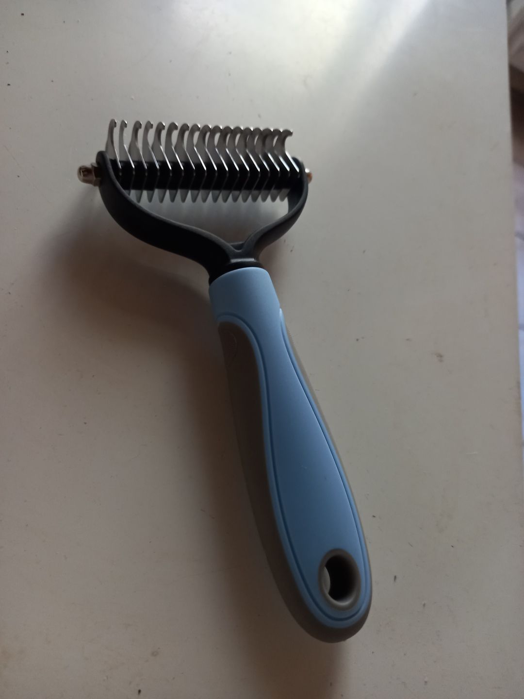 Customer photo review of Peigne de Toilettage Professionnel PuppySafe™