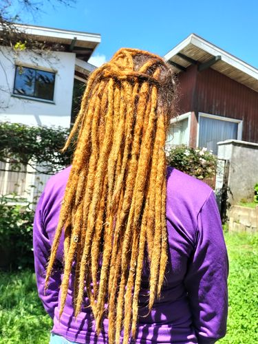Reseña con foto de un cliente sobre Henna Jamila Hair