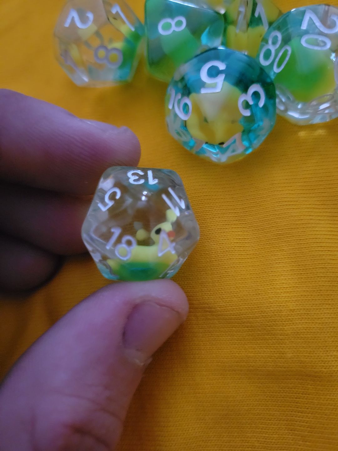 Customer photo review of Transparent Yellow Ducky - Dice Set