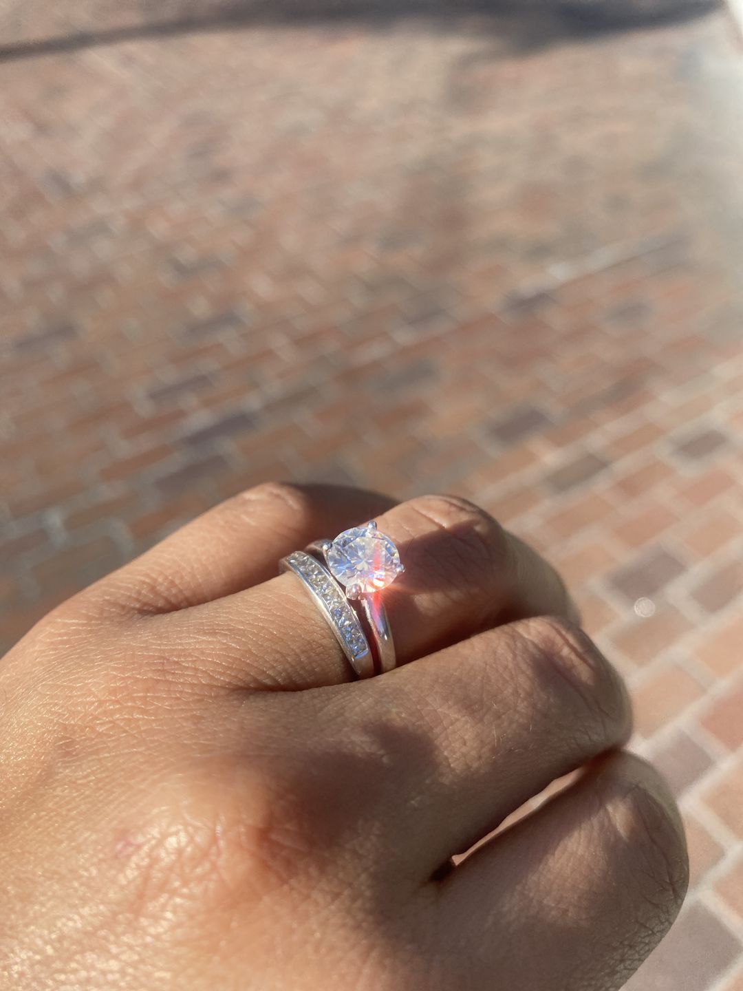 Customer photo review of Classic Solitaire Round Moissanite Four Prong Engagement Ring