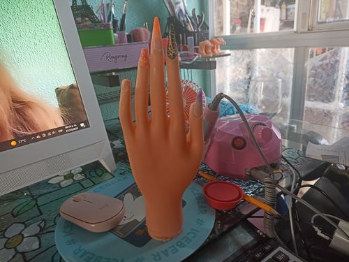 Customer photo review of Mano de Práctica sin Uña