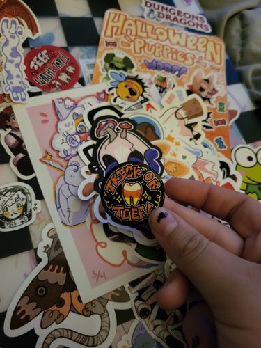 Customer photo review of Trick or Teef Buttons 1.5"