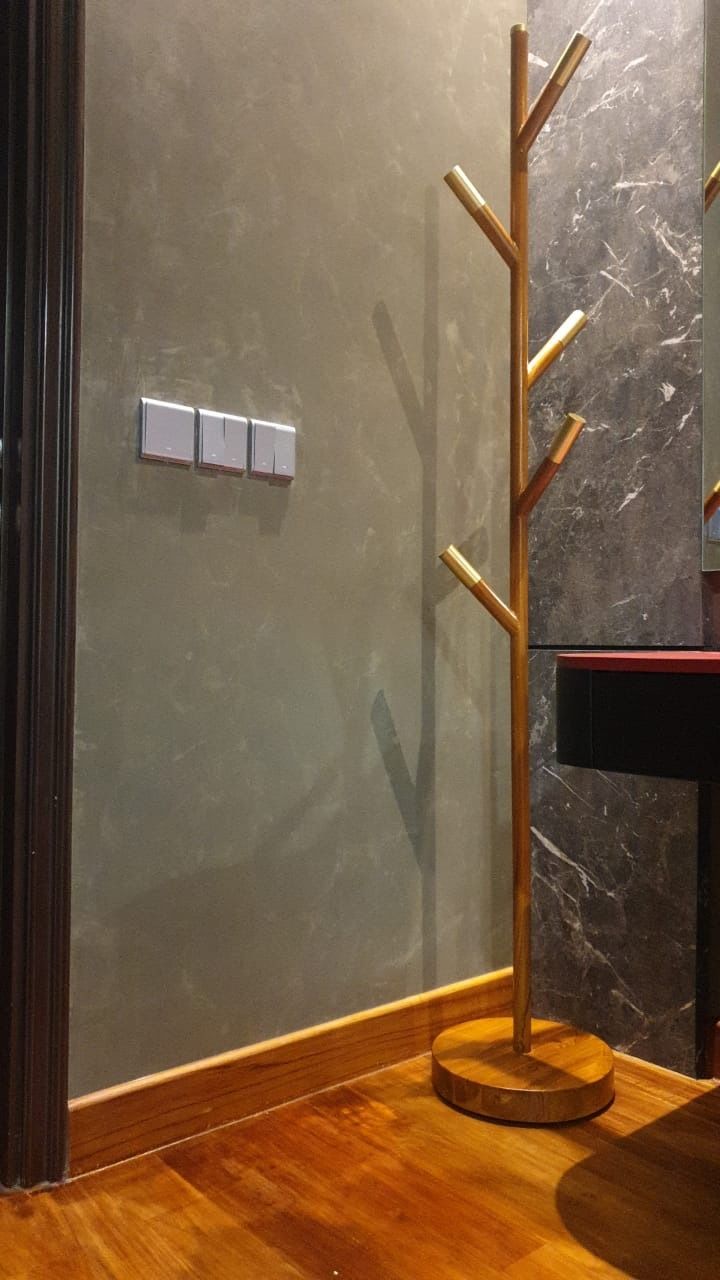 Customer photo review of Minimalist Teak Coat Rack – Branch Design