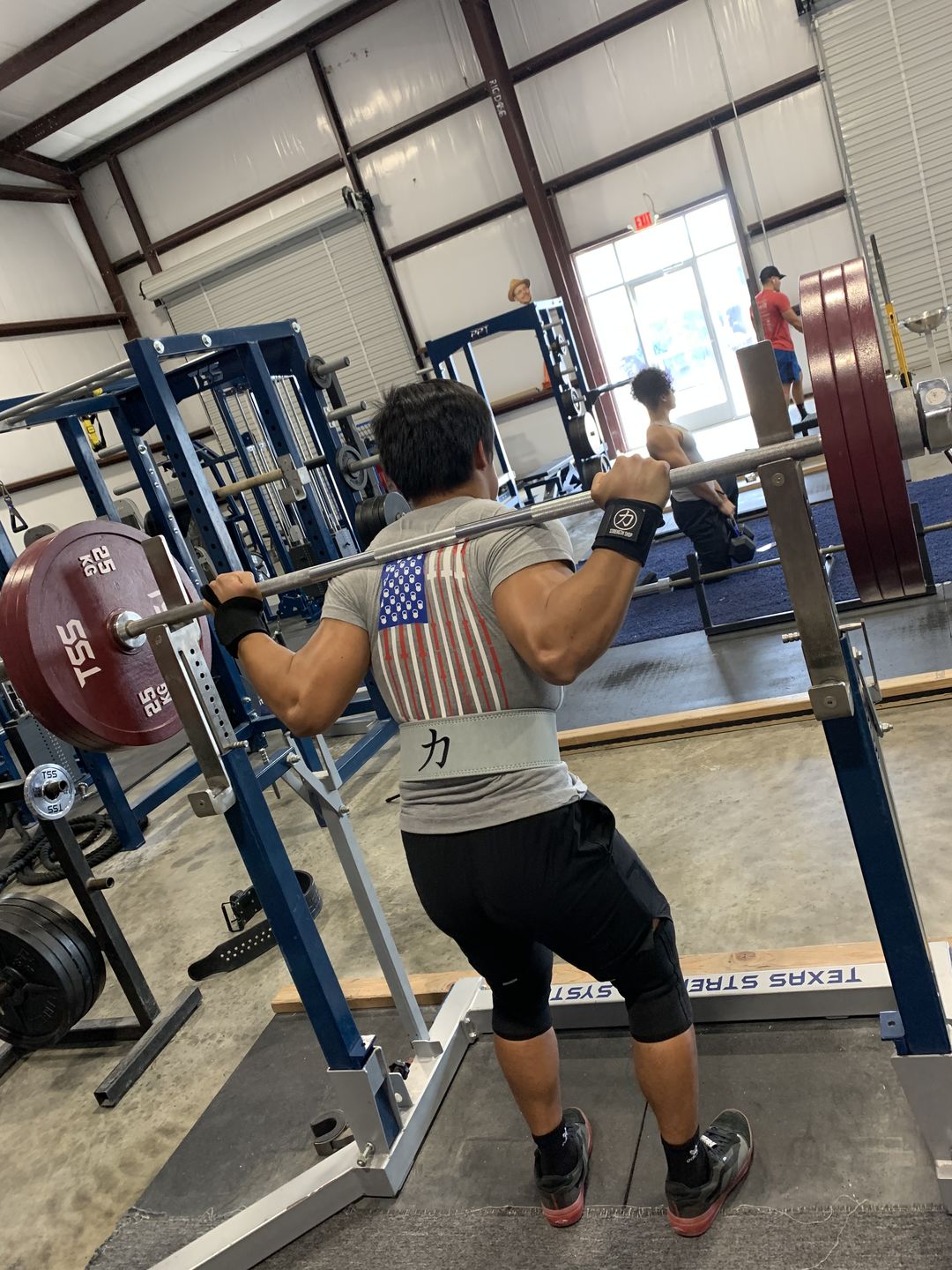 Customer photo review of Strength Shop Super Stiff Wrist Wraps - Black - IPF Approved