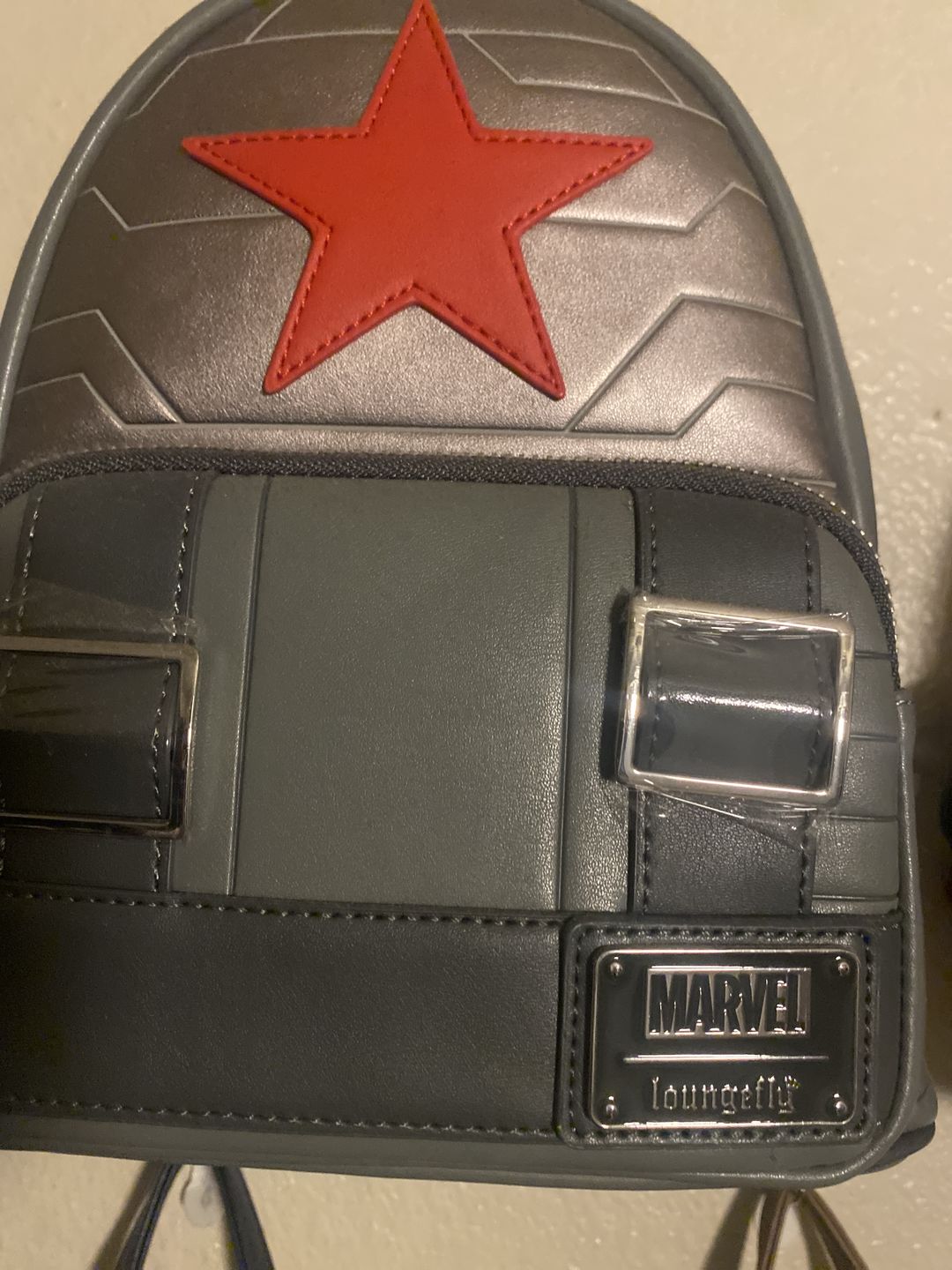 Customer photo review of Loungefly Marvel Winter Soldier Cosplay Mini Backpack