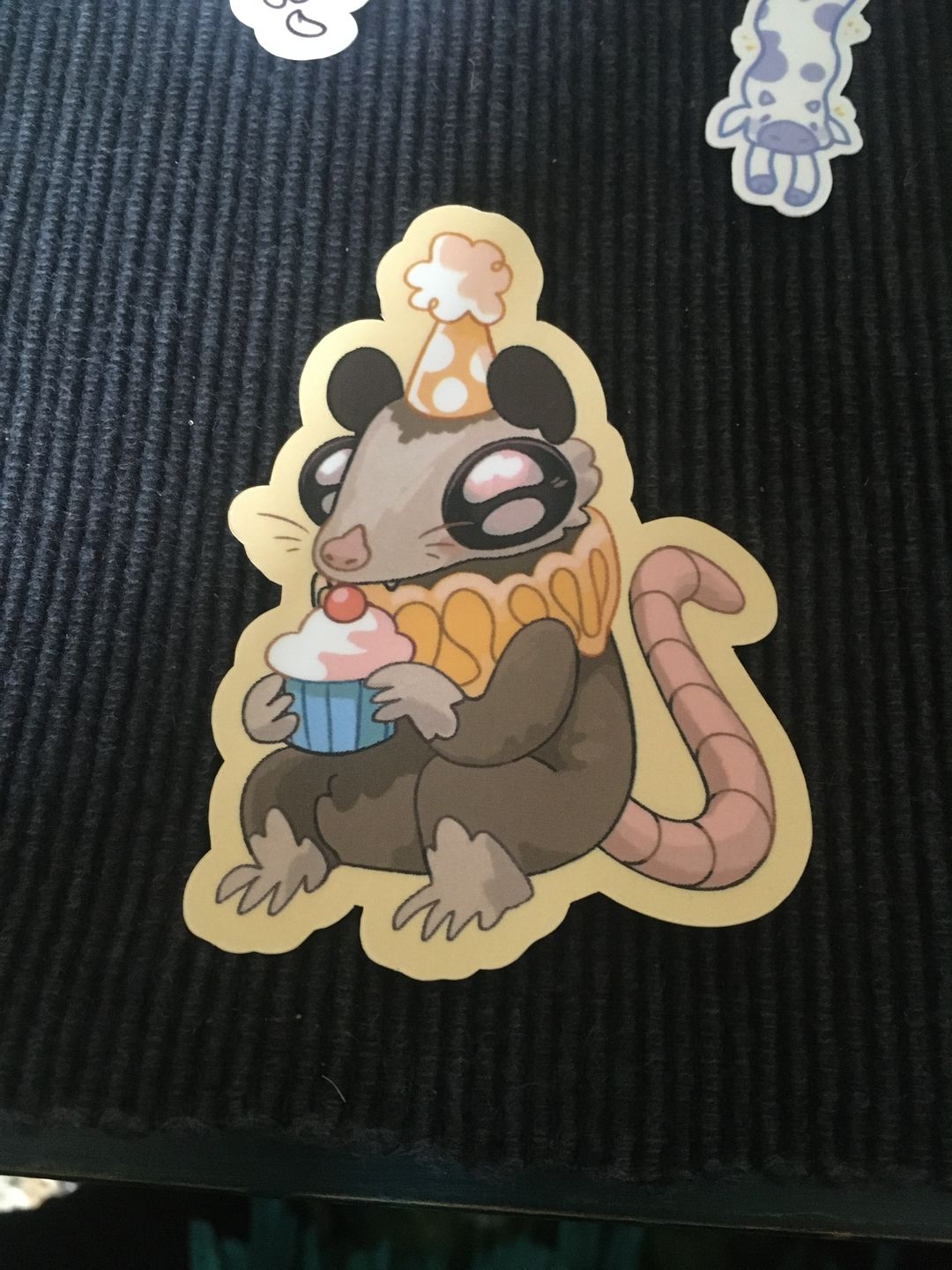Customer photo review of Sad Party Opossum Stickers!