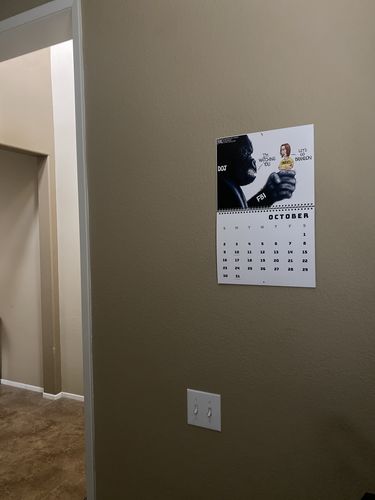 Customer photo review of 2023 Political Cartoons Calendar by A.F. Branco (Sept. 2022- Dec. 2023) Donkey Wokey Edition