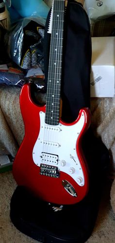 Customer photo review of Donner Solid Electric Guitar Kit Full Size 39 Inch with Amplifier, Bag, Capo, Strap, String, Tuner, Cable and Pick (Red, DST-100R)