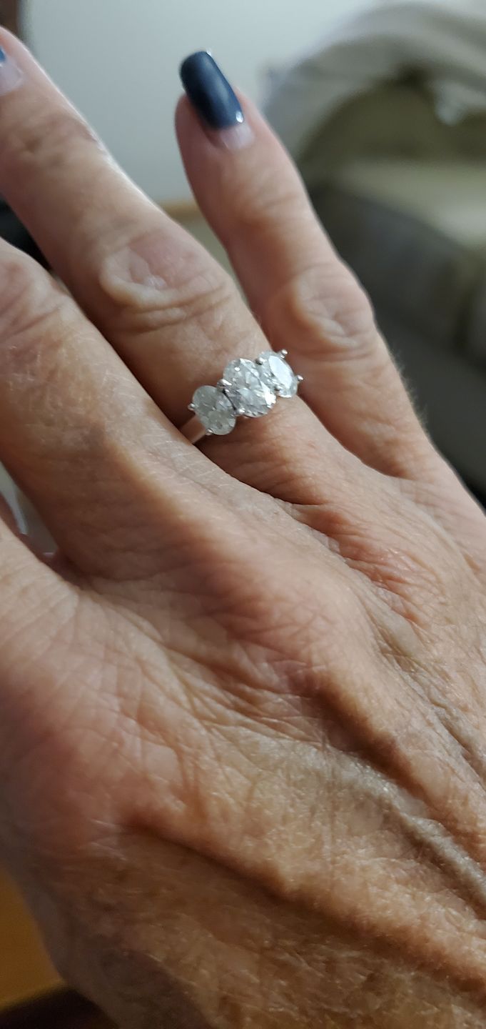 Customer photo review of Classic Three Stone Oval Cut Moissanite Engagement Ring