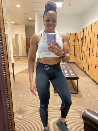 Customer photo review of Salty Savage Ladies 90’s Beach Edition Flowy Crop Top | In Your Face | Black/Multi