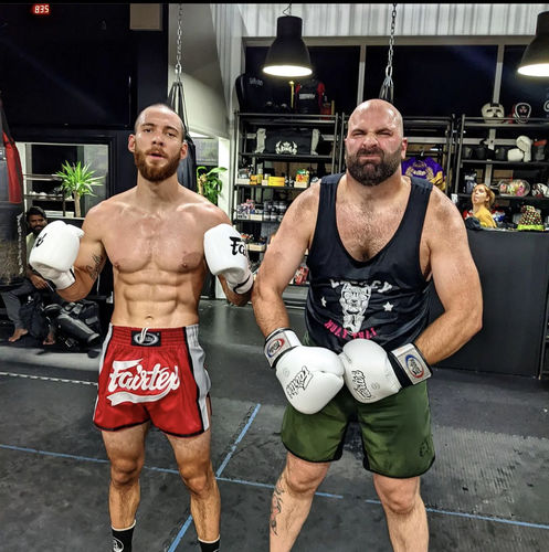 Customer photo review of FAIRTEX RED AND WHITE MUAY THAI SHORTS - BS1704