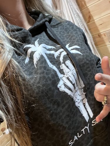 Customer photo review of Salty Savage Unisex Rock On Lounge Hoodie | Black Leopard/White
