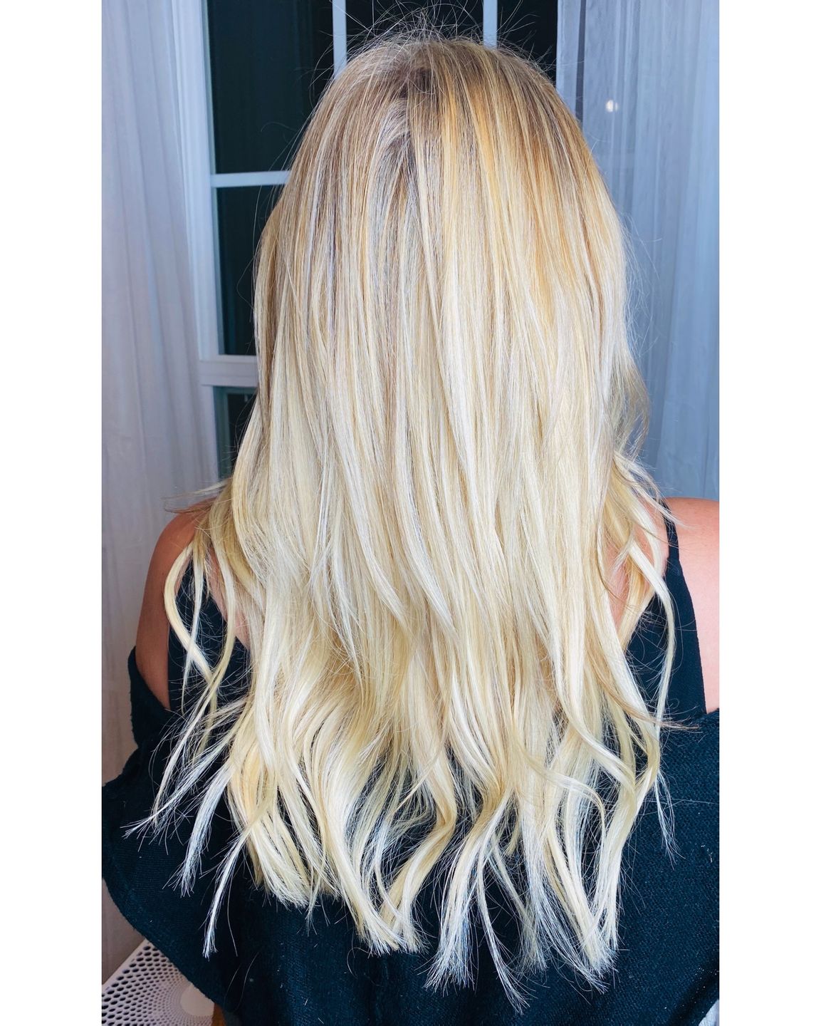 Customer photo review of Seamless Tape in Hair Extensions Best Virgin Hair Lightest Blonde #60