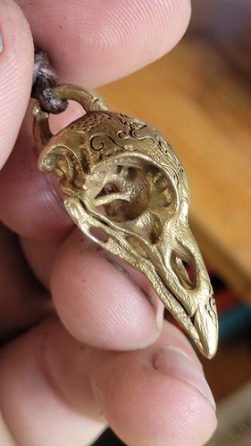 Customer photo review of Raven Skull Pendant