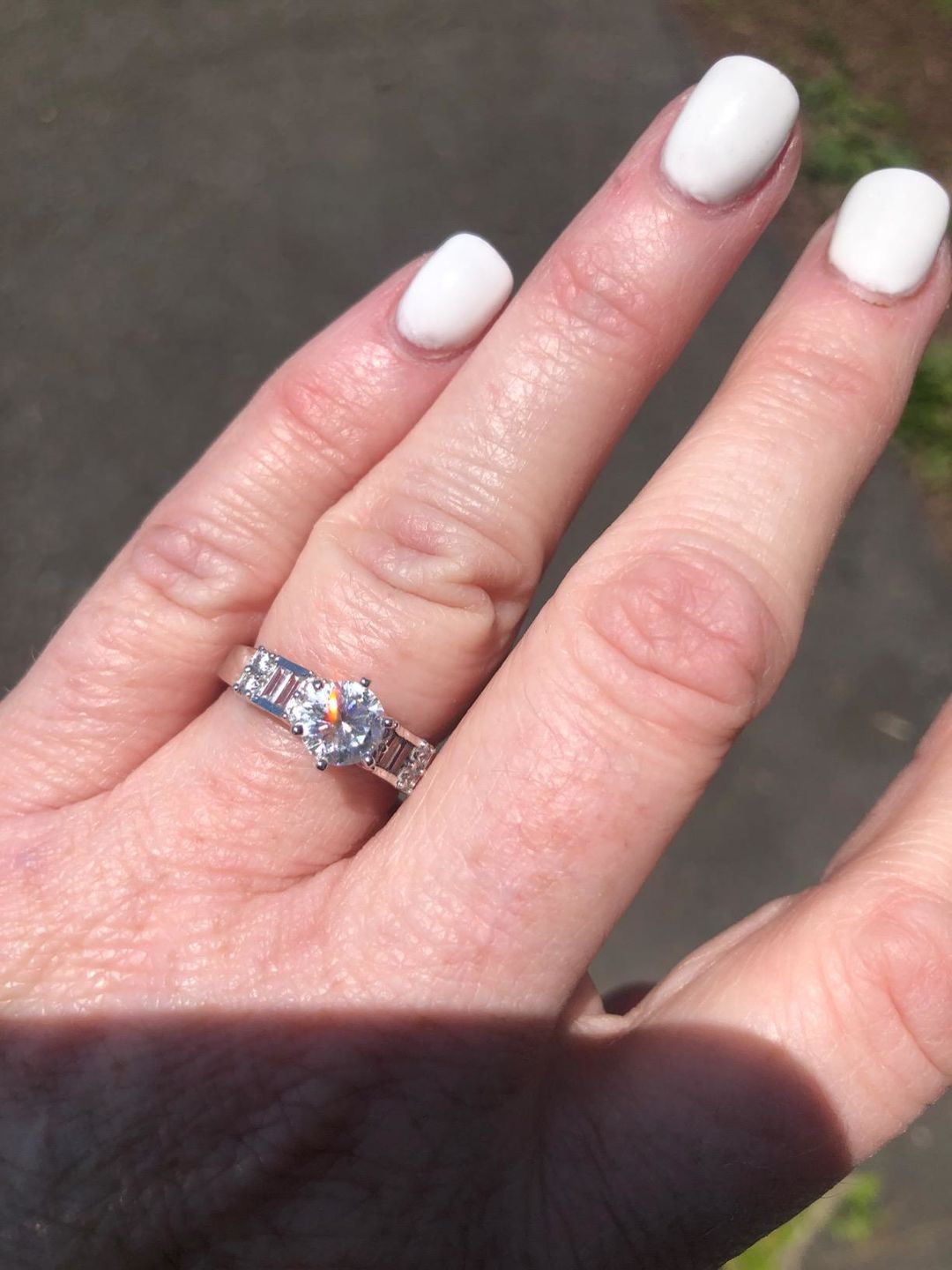 Customer photo review of Round Moissanite Emerald-Cut Side Stone Engagement Ring