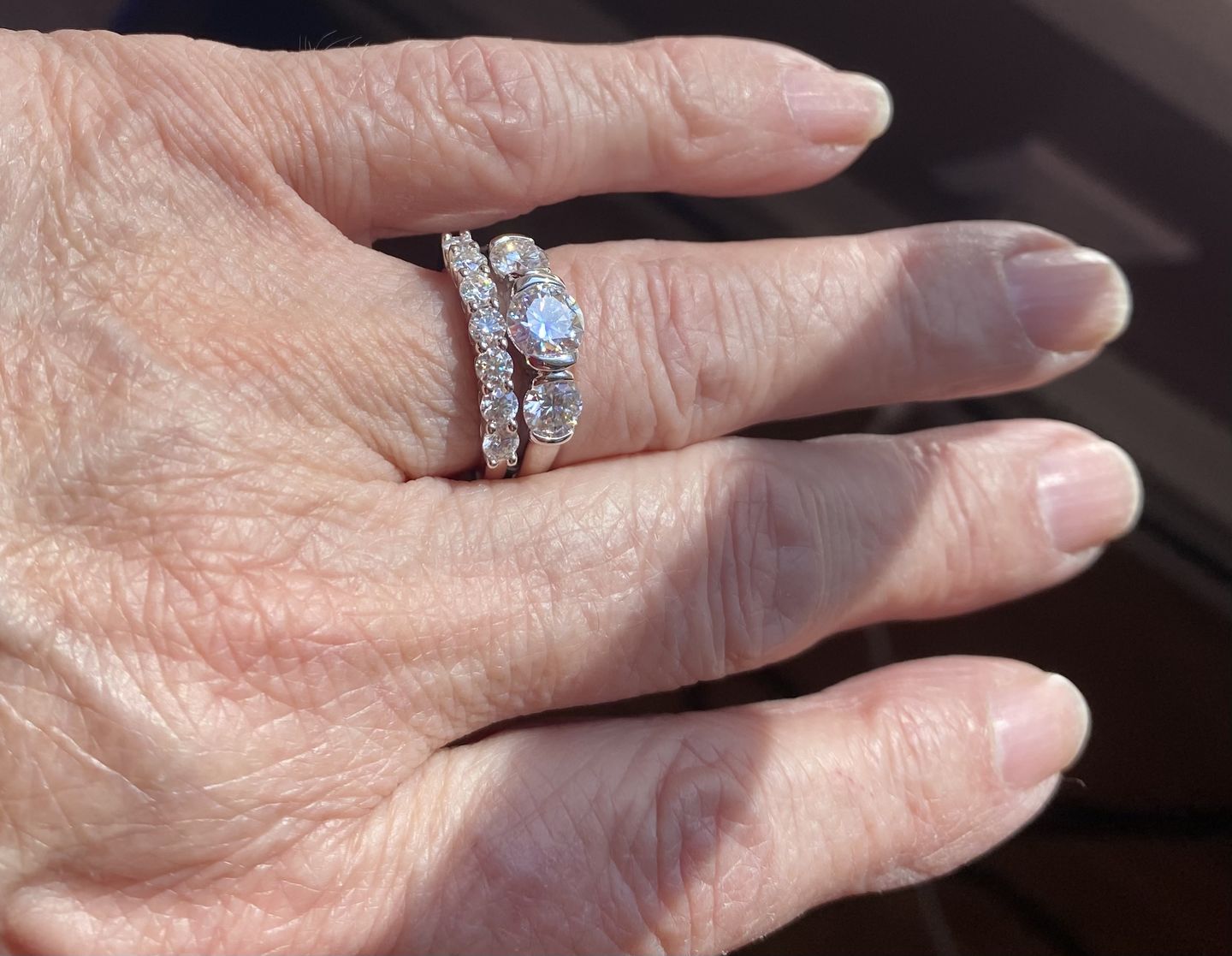 Customer photo review of Round Moissanite Sterling Silver Wedding Band Stackable Ring