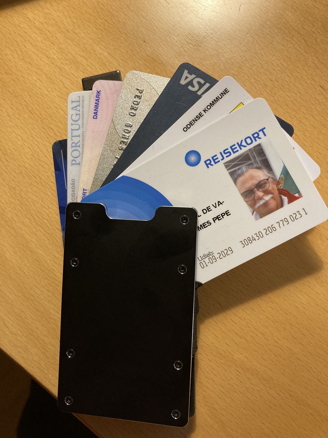 Customer photo review of Obsidian Black Metal Slim Wallet